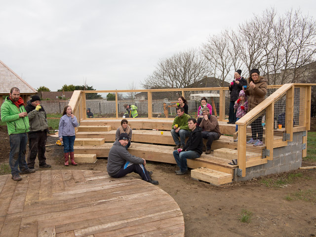 The structure of the outdoor classroom and some gardeners